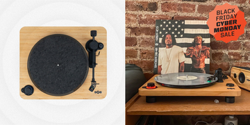 turntable setup with an album cover and a sale banner