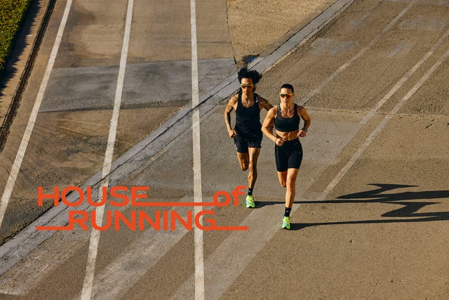 two people running on a road