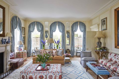 blue and white curtains in a turkish inspired patterned linen dress the drawing rooms fleet of windows