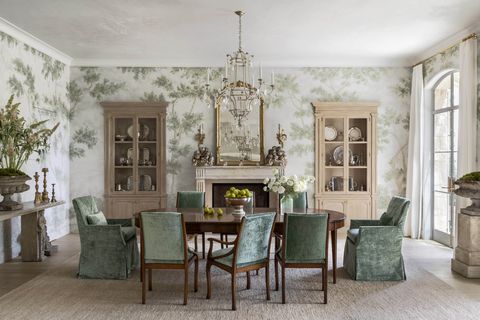 a woodland wall mural and mossy green velvet turn the dining room into a scenic extension of the out doors