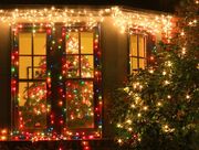 House window decorated with Christmas tree