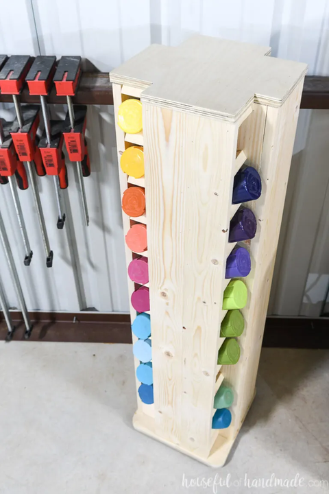 organize spray paint with vertical holder