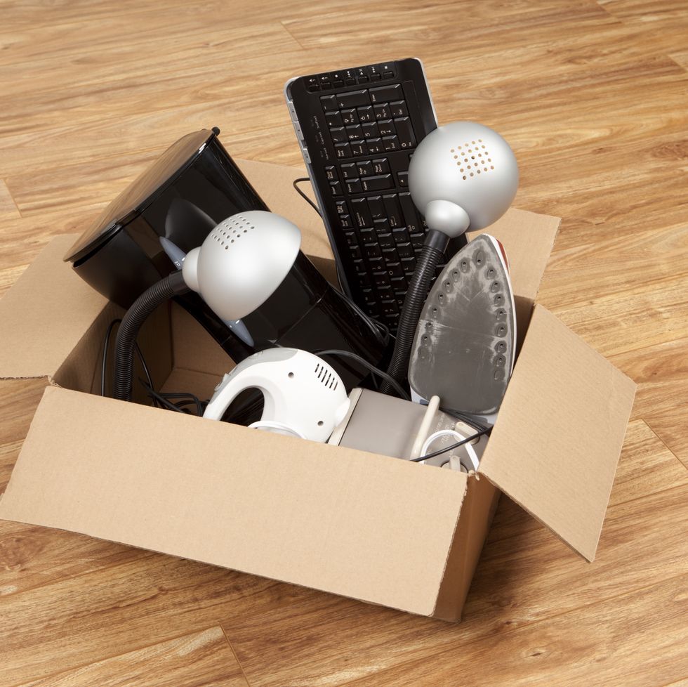 household equipment or appliances in a cardboard box