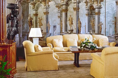 Living room, Furniture, Room, Couch, Interior design, Yellow, Wall, Wallpaper, Chair, Classic, 
