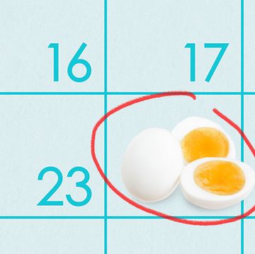 three hard boiled eggs against a blue calendar