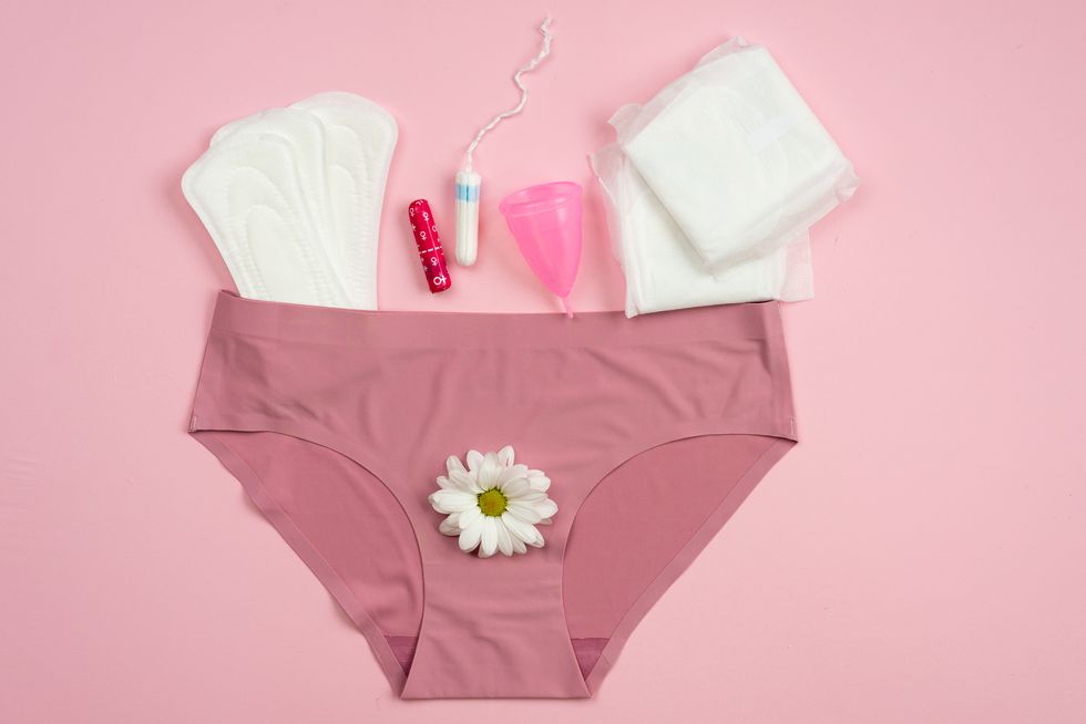underwear with protective equipment for critical days on a pink background