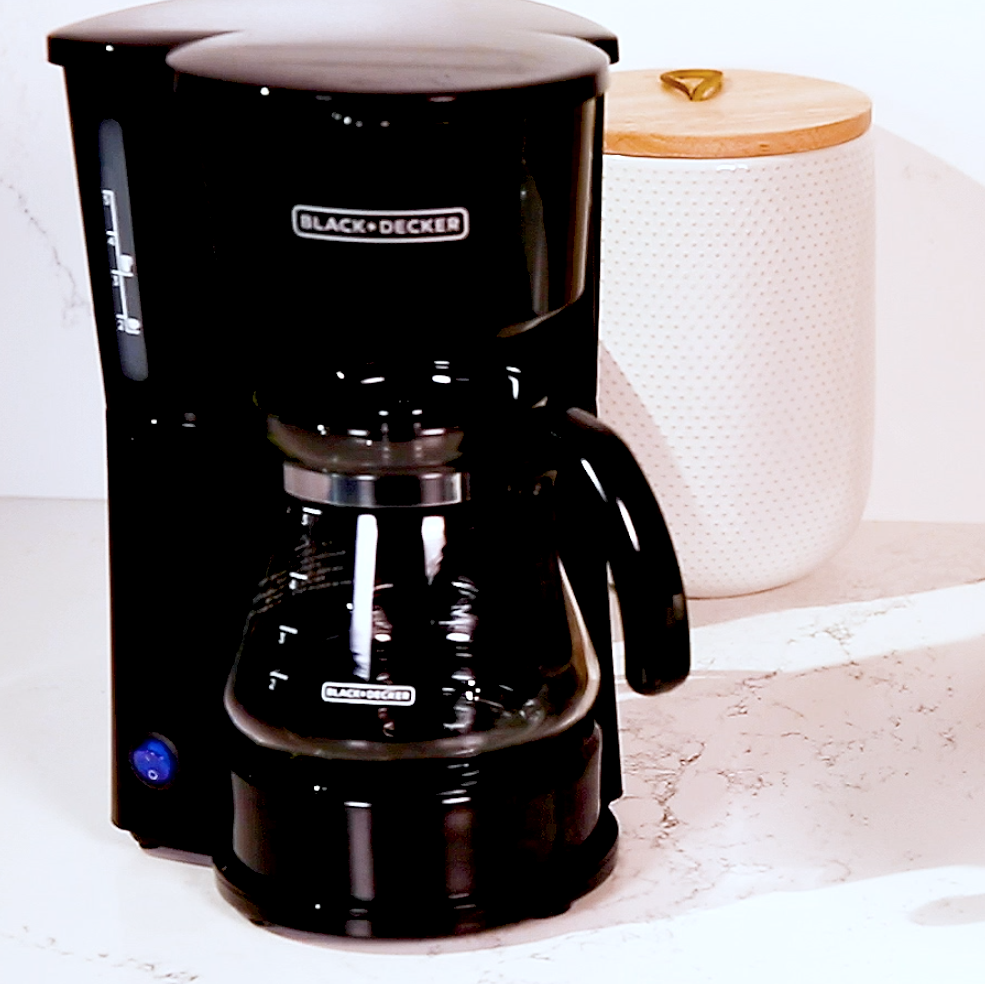 https://hips.hearstapps.com/hmg-prod/images/how-to-clean-coffee-maker-1643746732.png?crop=0.468xw:0.839xh;0,0&resize=1200:*