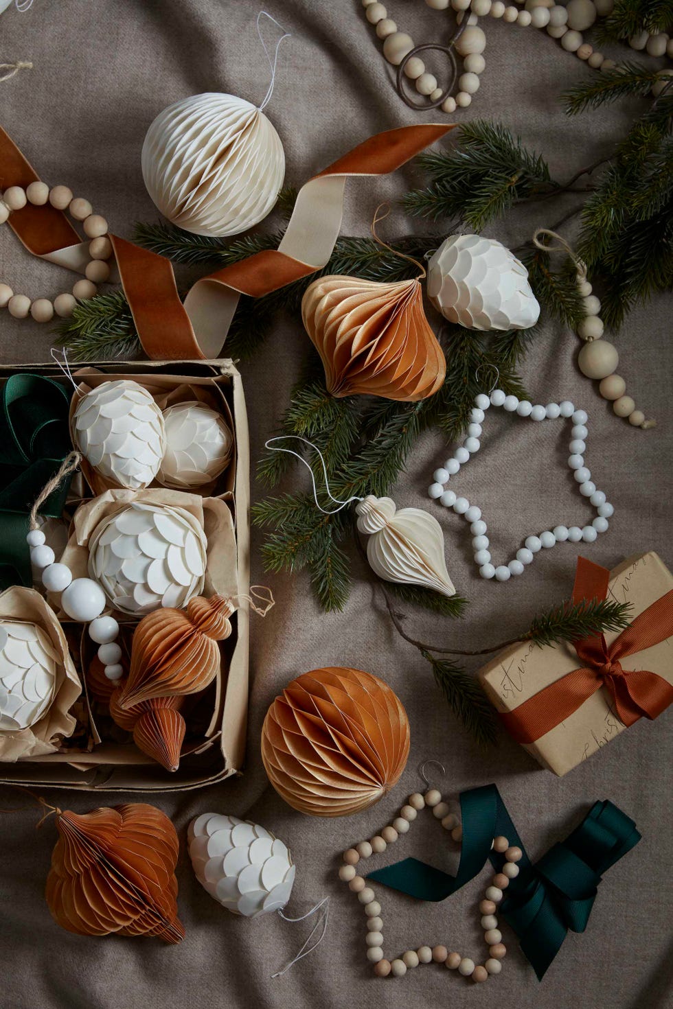 layered lounge christmas decorations, a group of objects on a surface