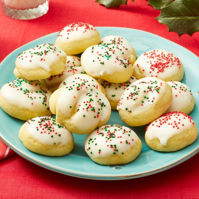 italian christmas cookies with red and green sprinkles on blue plate