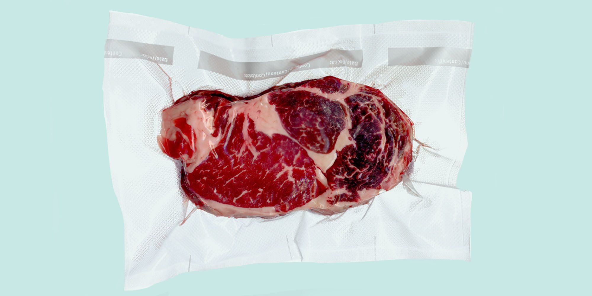 a raw steak on butcher paper