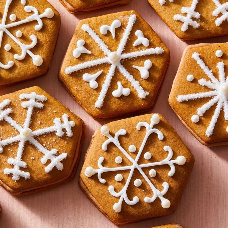 gingerbread cookies decorated with piped royal icing