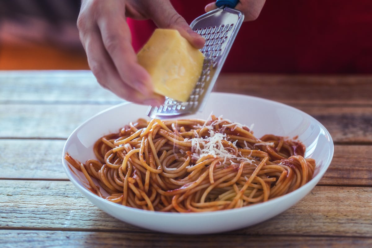 How To Properly Use A Handheld Cheese Grater, According To This TikToker