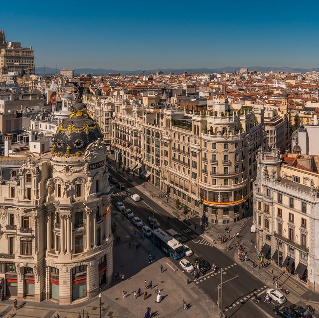 downtown madrid, spain, where the calle de alcala meets the gran via these are two of the most famous and busy streets in madrid