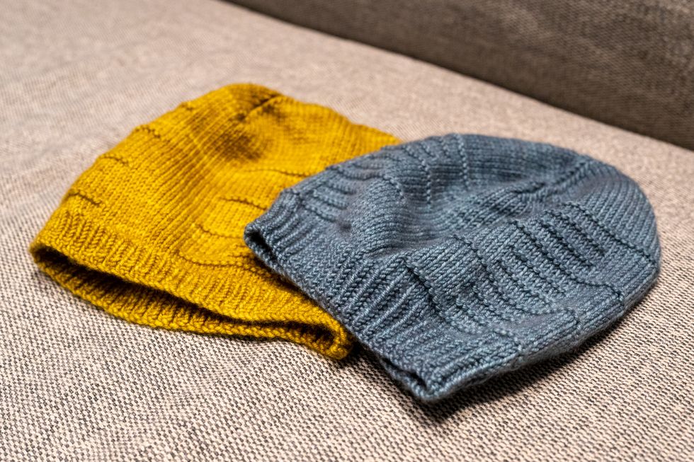 yellow and grey knit beanies