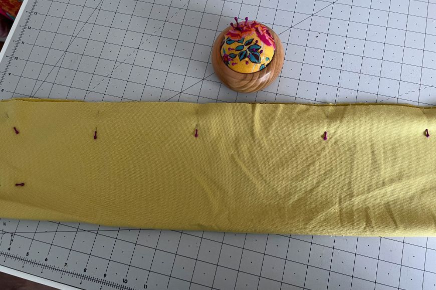how to make a draught excluder, step by step, pinning the fabric