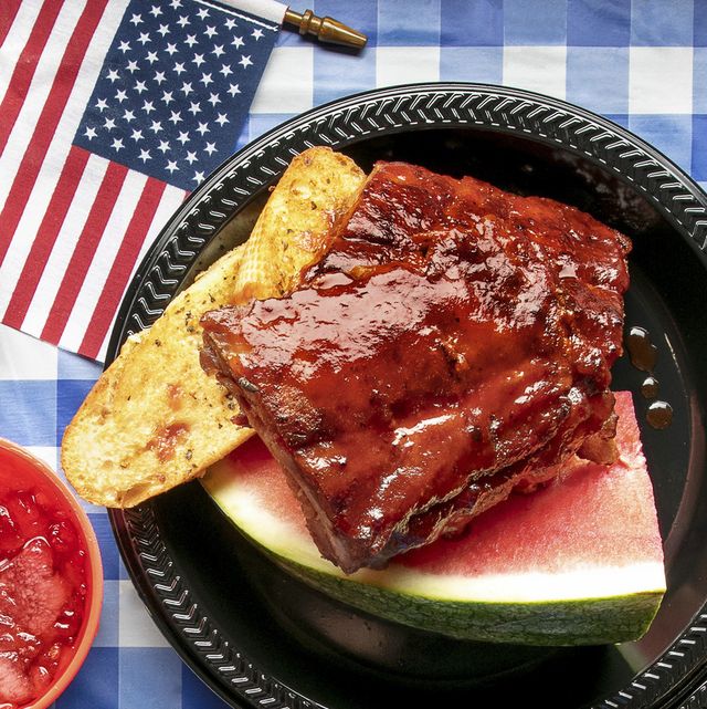 sweet and smoky ribs with barbecue sauce and watermelon with american flag