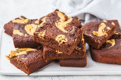 brownie with peanut butter on white background