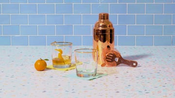 cocktail mixer and whiskey glasses with clear ice