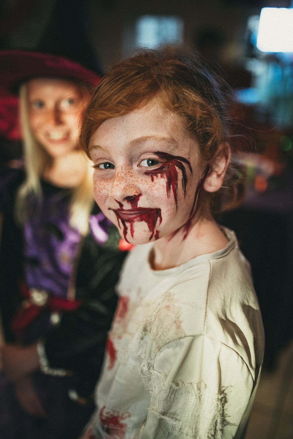 a child dressed in a zombie costume for halloween