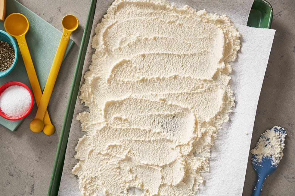 ricotta spread on baking sheet