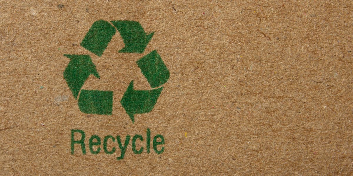 packing cardboard with sign to recycle instead of throwing in garbage