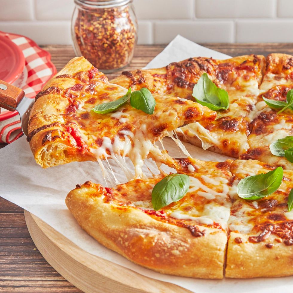 https://hips.hearstapps.com/hmg-prod/images/how-to-reheat-pizza-645a7b327db9a.jpeg?crop=1xw:1xh;center,top&resize=980:*
