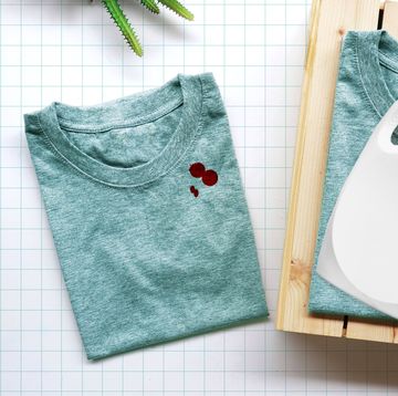 t shirts with wood box and laundry detergent and cactus on background