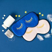 a pair of sleep eye masks and other tools used to fix sleep hygiene