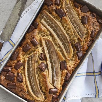 banana bread with chocolate chunks and long slices of banana baked into the top