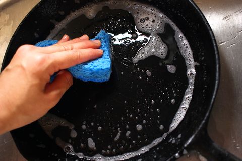how to season a cast iron pan   delishcom