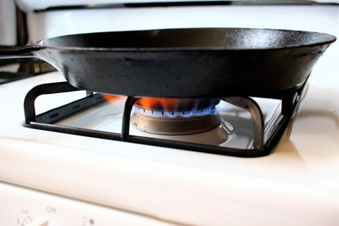 how to season a cast iron pan   delishcom