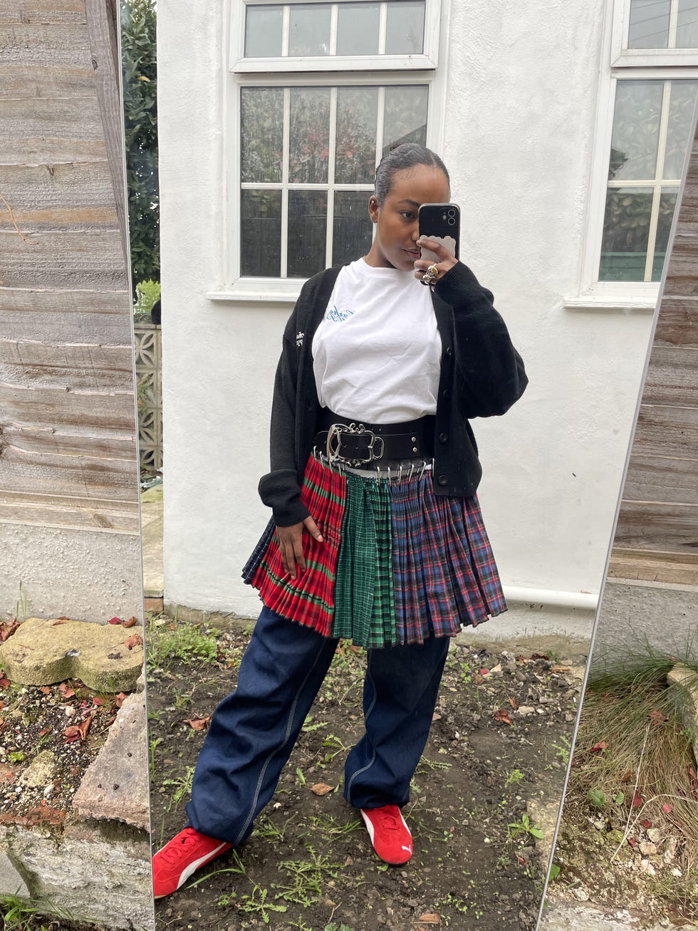 amel mukhtar wears a chopova lowena skirt over jeans