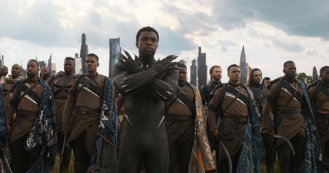 chadwick boseman as t'challa in a scene from black panther, the 18th movie if you want to watch all the marvel movies in order