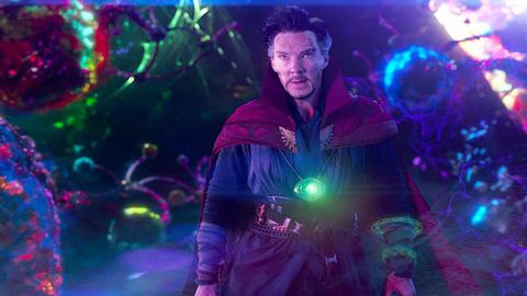 dr strange wears a cloak in a scene from doctor strange, the 14th movie if you want to watch all the marvel movies in order