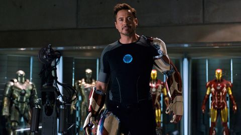tony stark wears an arc light in his chest in a scene from iron man 3, the seventh movie if you want to watch all the marvel movies in order
