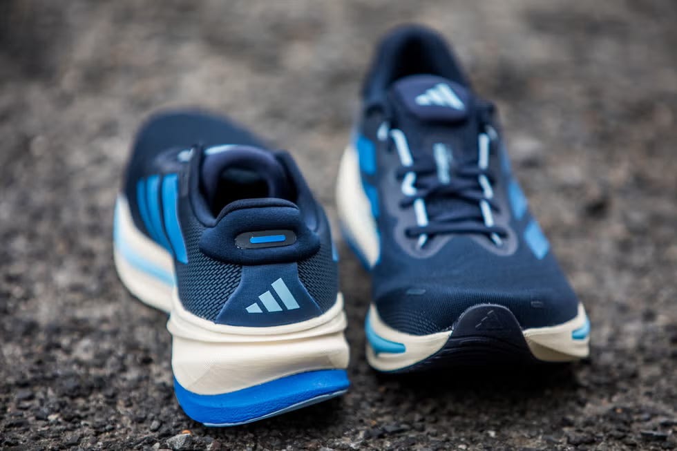 athletic footwear featuring blue and white color scheme
