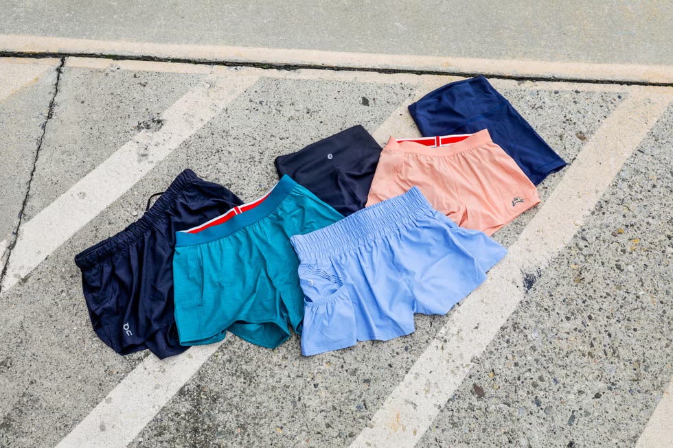 collection of different colored shorts laid out on a surface collection of different colored shorts laid out on a surface