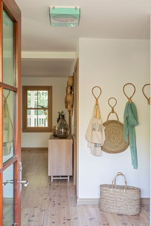 open doorway, wooden flooring, flax basket