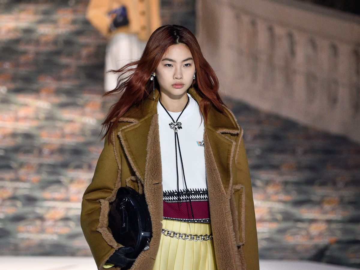 HoYeon Jung walks the runway during the Louis Vuitton Womenswear