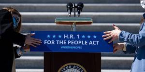 washington, dc   march 03 staffers place a sign on a podium in preparation for a news conference with house democrats regarding hr 1, the for the people act, on capitol hill on wednesday, march 3, 2021 in washington, dc  kent nishimura  los angeles times via getty images