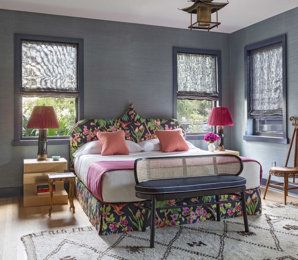 bedroom, dark gray wallcovering, tropical floral headboard and bed set