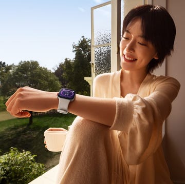 a person wearing a white dress and holding a coffee cup a person wearing a white dress and holding a coffee cup