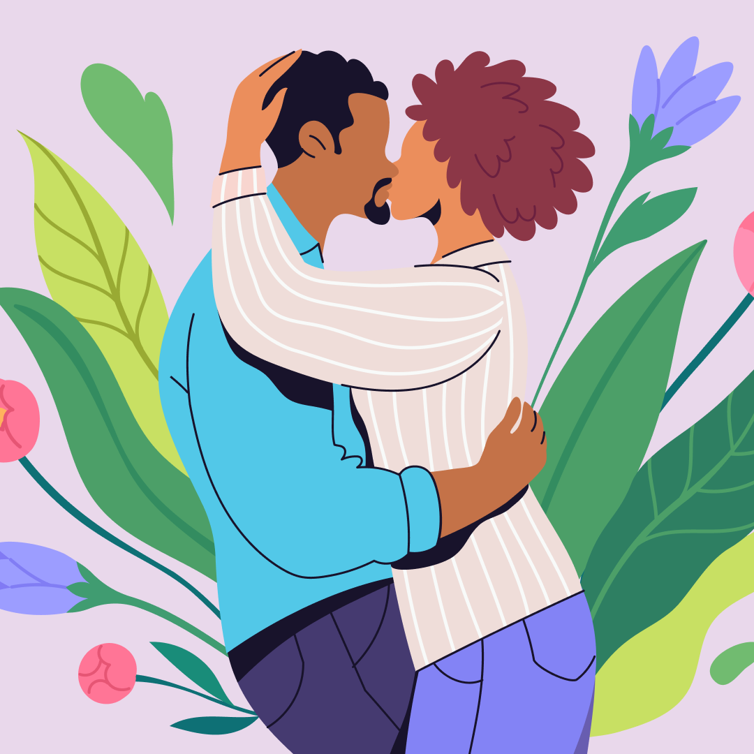 couple hugging with flowers behind