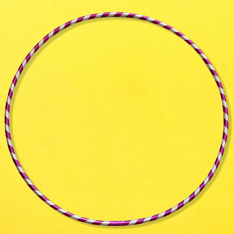 striped hula hoop on yellow background