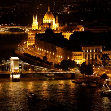 hungary, central hungary, budapest, danube, capital city, night shot, illumination, panoramic view from buda across the chain bridge to pest, behind the margaret bridge and the hungarian parliament, parliament building by imre steindl at the danube bank,