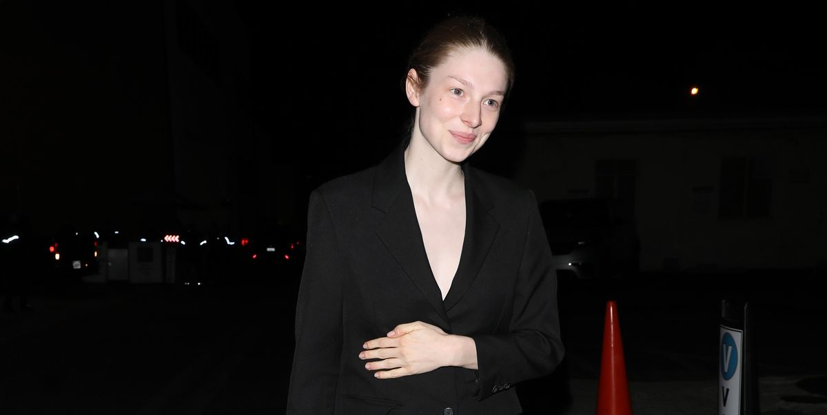 Hunter Schafer Makes a Black Suit Look So Interesting with an Unexpected Pop of Color