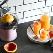 pink hurom citrus juicer with grapefruit juice pink hurom citrus juicer with grapefruit juice