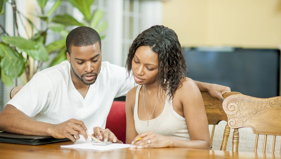Husband and Wife Balancing Their Budget
