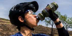 rosael torres drinking from her water bottle after a mtn bike ride in 2023