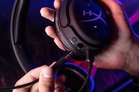 man holding cord for hyperx cloud orbit s gaming headset